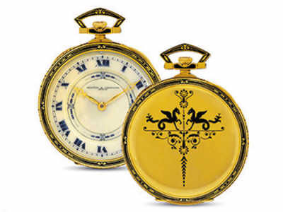 江诗丹顿，18K金及珐琅装饰，配象牙表盘，1922年制，在香港佳士得2012年秋拍中以20万港元成交(约合人民币16万元)。