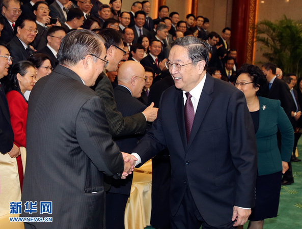 12月15日，中共中央政治局常委、全国政协主席俞正声在北京会见参加“纪念中美建交35周年研讨会”的侨界和专家学者代表。 新华社记者丁林 摄