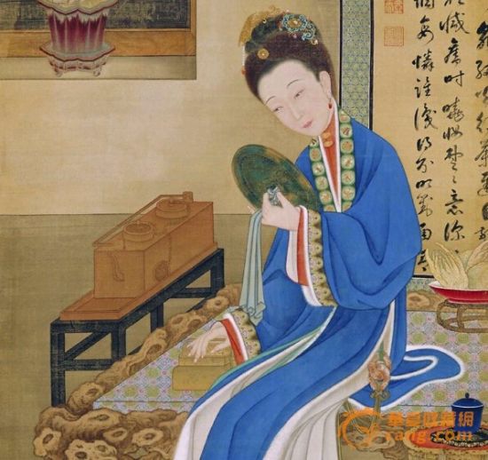 　　《裘装对镜图》中的佛手香橼，一旁的水仙也揭示其季节