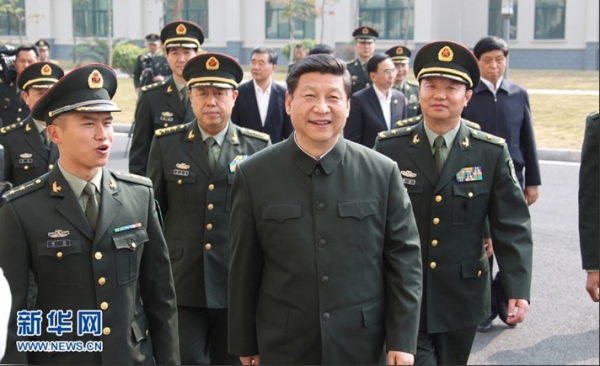 习近平:全面实施军改战略 重新调整划设战区