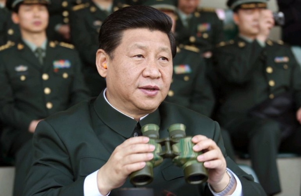 习近平:全面实施军改战略 重新调整划设战区