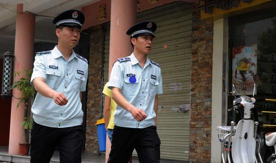 国务院：归并执法队伍 城管协管人数禁超在编人员2