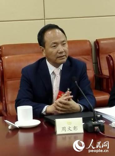 全国政协委员、国家行政学院原副院长周文彰