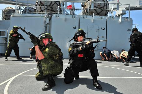 专家披露中俄南海演习内容：美日军机将聚集侦察