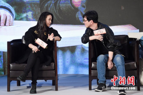 汤唯与老公金泰勇 张曦 摄