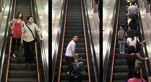 方琛宇2009年的作品《上自动扶梯》