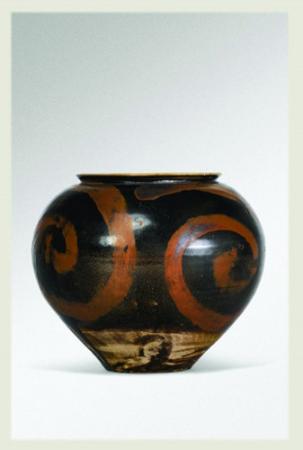 宋黑釉铁绣花涡纹罐