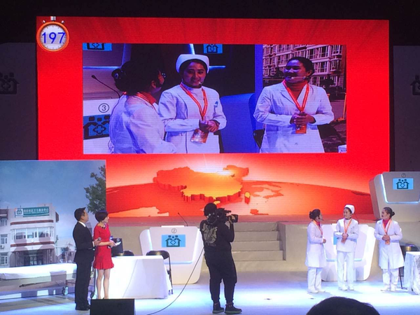 四、北京市顺义区的三名基层医务工作者进入“情境再现”比赛环节。 人民政协网 记者  张春莉  摄