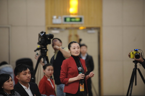 中国教育电视台记者提问。