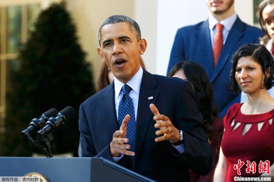 资料图：2013年，时任美国总统奥巴马宣传医改法案。