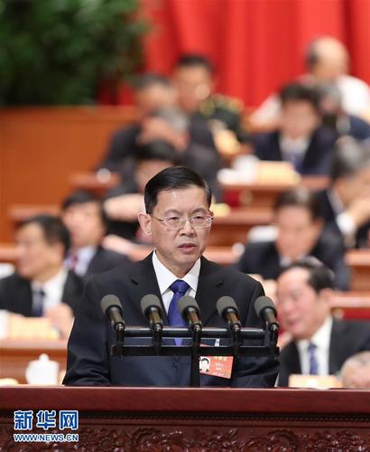 3月9日，全国政协十二届五次会议在北京人民大会堂举行第二次全体会议。这是郝明金委员代表民建中央作《培育发展新生中小城市推进新型城镇化建设》的发言。 新华社记者 张铎 摄