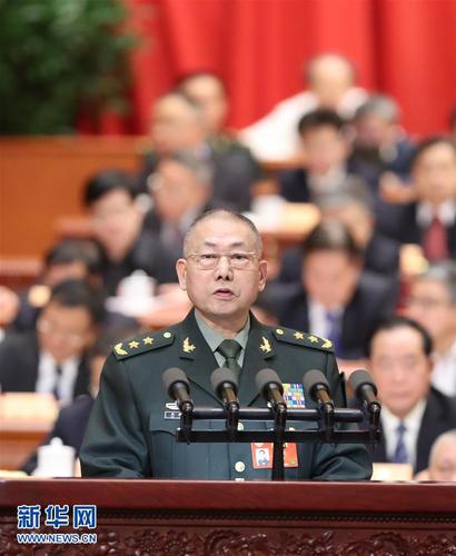 3月9日，全国政协十二届五次会议在北京人民大会堂举行第二次全体会议。这是刘继贤委员作《实施军民融合发展战略的思考与建议》的发言。新华社记者 刘卫兵 摄