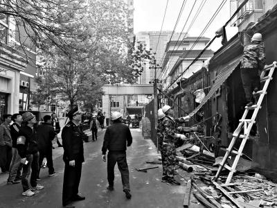 北京三里屯治开墙打洞问题 负责人:不避