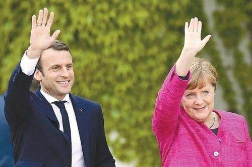 马克龙与德国总理默克尔。