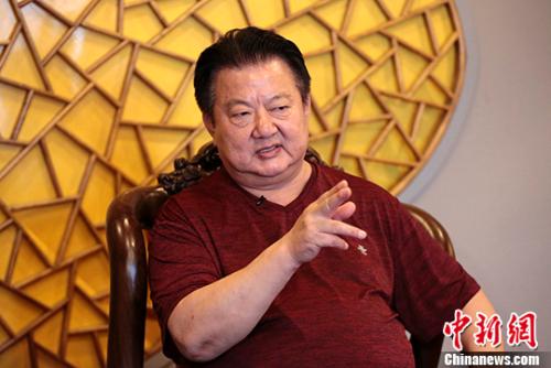 中国人民解放军陆海空三军仪仗队原大队长程志强日前在北京接受<a target='_blank' href='http://www.chinanews.com/'>中新社</a>记者专访，描述其亲历的香港回归细节，追忆北京时间1997年6月30日23时59分48秒，香港会展中心内的香港政权交接仪式关键时刻、香港回归前的最后12秒的故事。 <a target='_blank' href='http://www.chinanews.com/'>中新社</a>记者 李慧思 摄