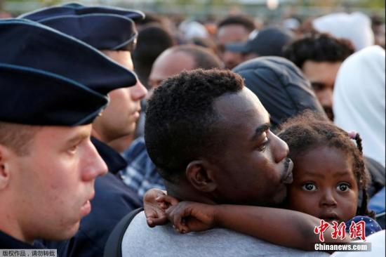资料图片：难民。