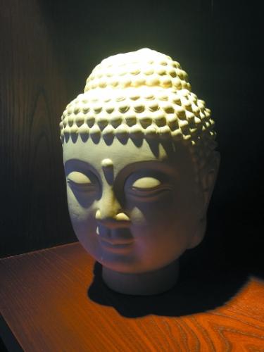 赵伟范制的葫芦佛头像。