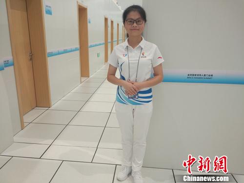 志愿者韩淑瑜。<a target='_blank' href='http://www.chinanews.com/' >中新网</a>记者 李金磊 摄