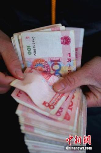 资料图：工资收入。