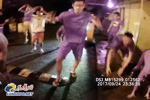 酒驾男欲逃检测喊朋友助阵 叫来20名小弟做俯卧撑