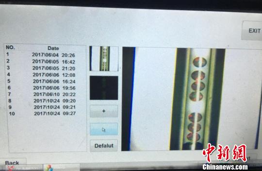 在这台光子晶体微球自动化检测仪的屏幕上，检测结果全程可视化?！∩耆?摄