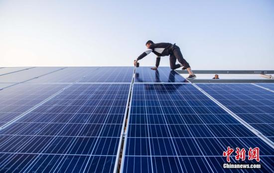 图为拍摄于12月9日的电站外景?！?<a target='_blank' href='http://www.chinanews.com/'>中新社</a>记者 杨艳敏 摄