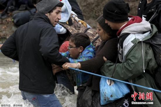 资料图片:难民。 点击进入下一页