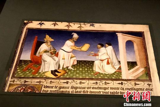 来自《马可·波罗游纪》抄本的忽必烈赏赐金牌插图。　邓霞 摄
