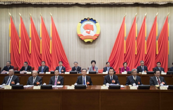 全国政协十三届常委会第一次会议开幕　　汪洋出席
