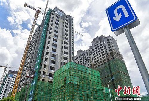 资料图：在建海南楼盘。 <a target='_blank' href='http://www.chinanews.com/'>中新社</a>记者 骆云飞 摄
