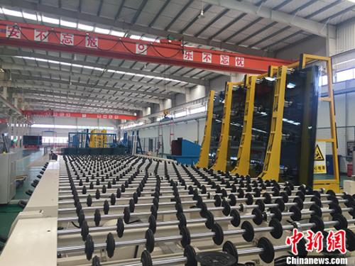 资料图：生产车间。 <a target='_blank' href='http://www.chinanews.com/'>中新社</a>记者 吴兰 摄