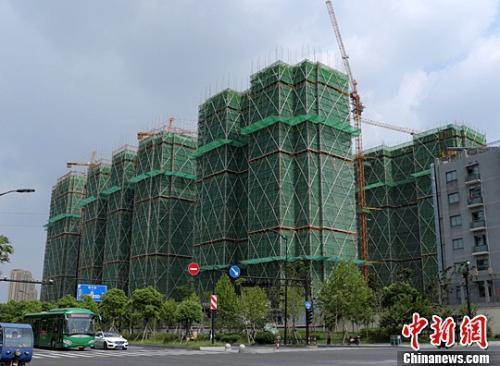 资料图：浙江杭州一楼盘正在建设中。<a target='_blank' href='http://www.chinanews.com/'>中新社</a>记者 王 刚 摄