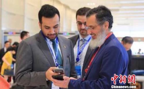 资料图：外商来浙江洽谈投资合作 沈汝汝摄