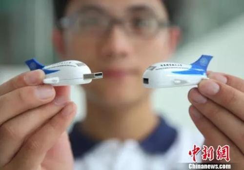 现在的u盘更多以礼品等形式出现。泱波 摄