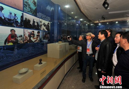 本次文物展通过文物展出、图片展示、文字介绍等方式，让游客进行一次探秘之旅?！〕陆ü?摄