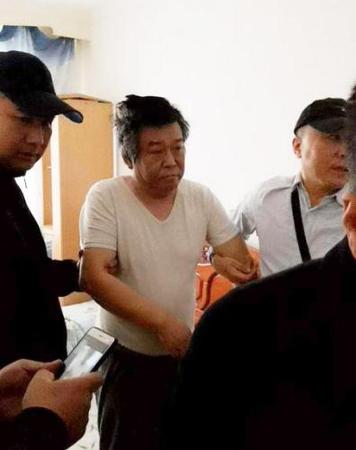 程鹏在牡丹江市某小区被抓获(牡丹江市公安局华电分局 赵宇 摄)