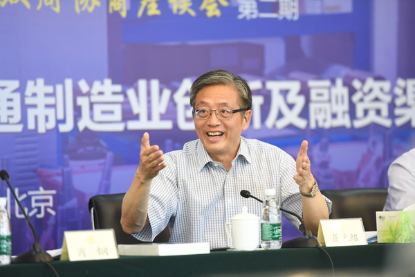 2、全国政协委员屠光绍