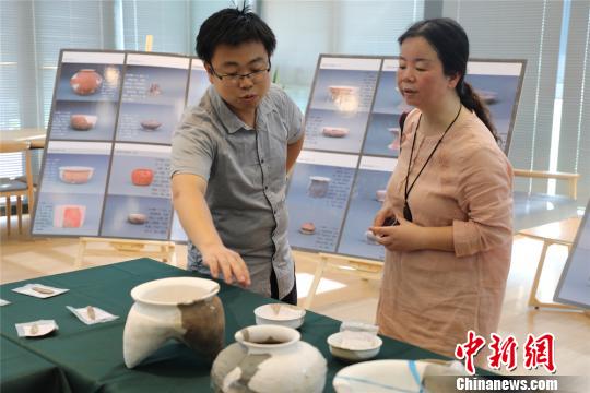 图为文物遗存进行展示?！」芤嗝?摄