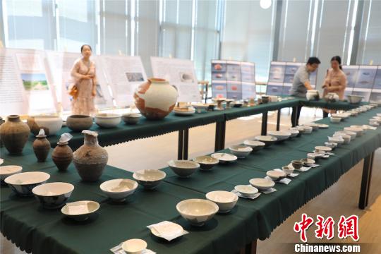 目前考古所修复的文物标本有100余件?！」芤嗝?摄