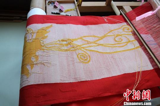 纬线约14万根，寓意14亿中华儿女同心共筑中国梦 遂昌提供 摄