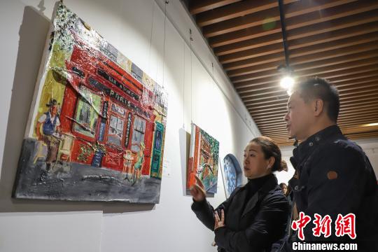 图为展览活动现场?！■暮曷?摄