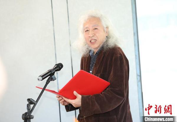 北京日报高级记者、诗人彭俐 王刚 摄