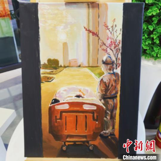 医护人员陪同患者看夕阳的照片被宁夏画师创作成为油画作品?！±钆迳?摄