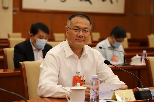 全国政协委员揭新民