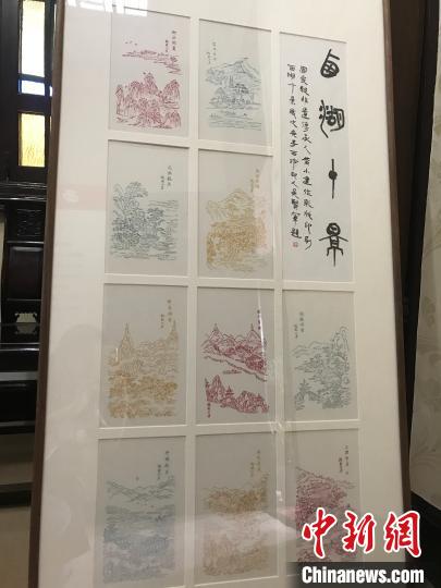 图为国家级非物质文化遗产传承人黄小建创作的“西湖十景”饾版拱花木板作品 江杨烨 摄