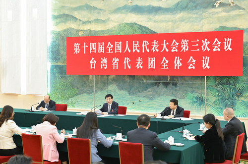 3月7日下午，中共中央政治局常委、全国政协主席王沪宁参加十四届全国人大三次会议台湾代表团审议。新华社记者 高洁 摄