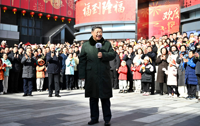 新华图讯丨习近平春节前夕在北京看望慰问基层干部群众